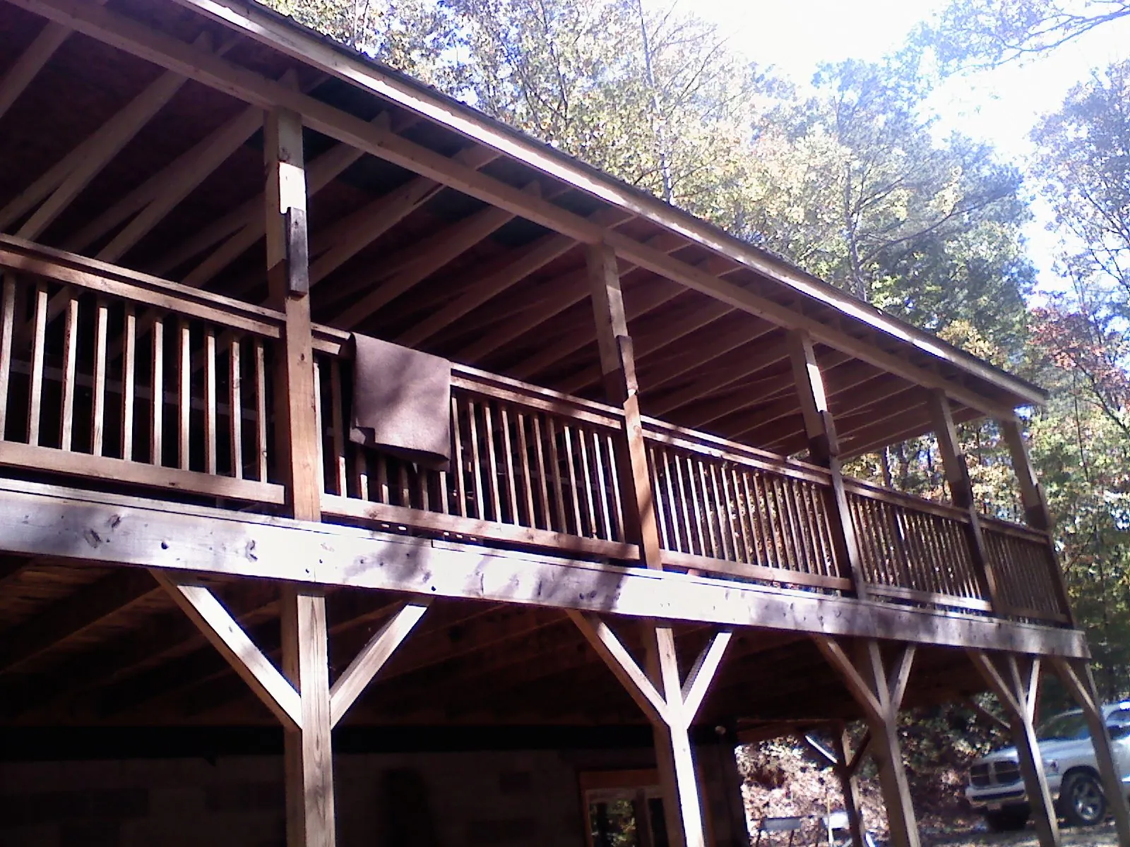 Timber framing under a new elevated porch and deck — Roof Leak Repair in Coleman by Roofing Brothers